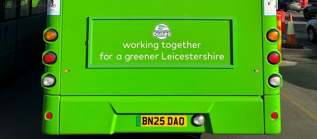 Rear of a green bus