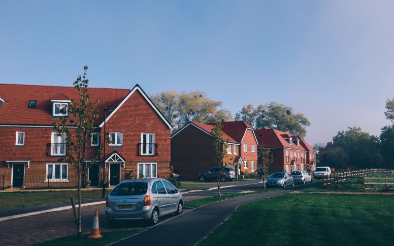 Cars parked in a suburban housing estate in the UK. For driving, car sharing, and road safety.