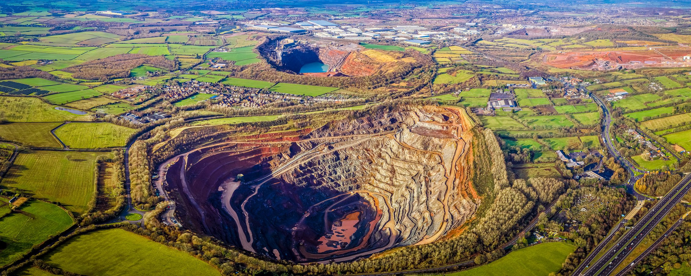 Aerial view of an open-pit quarry and industrial landscape near Coalville, North West Leicestershire.