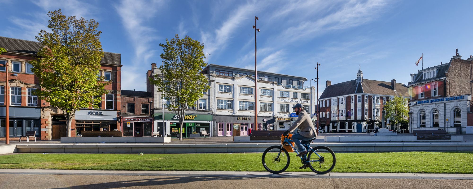 Person cycling through Jubilee Square, Leicester city centre.