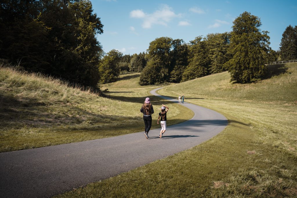 People walking in a park in the UK.