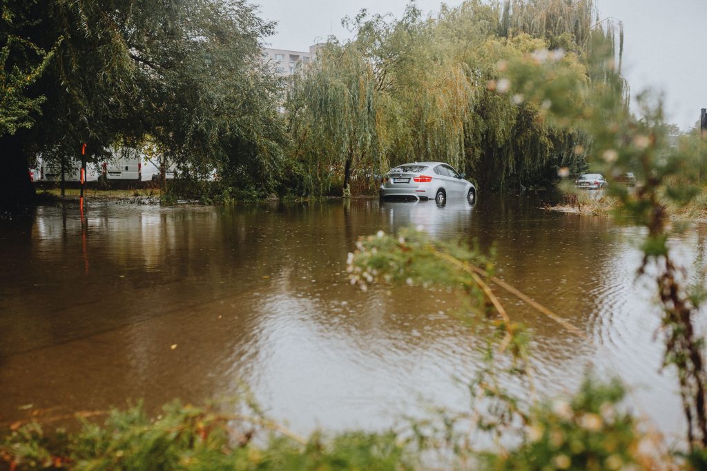 cars struggling to get through flood water